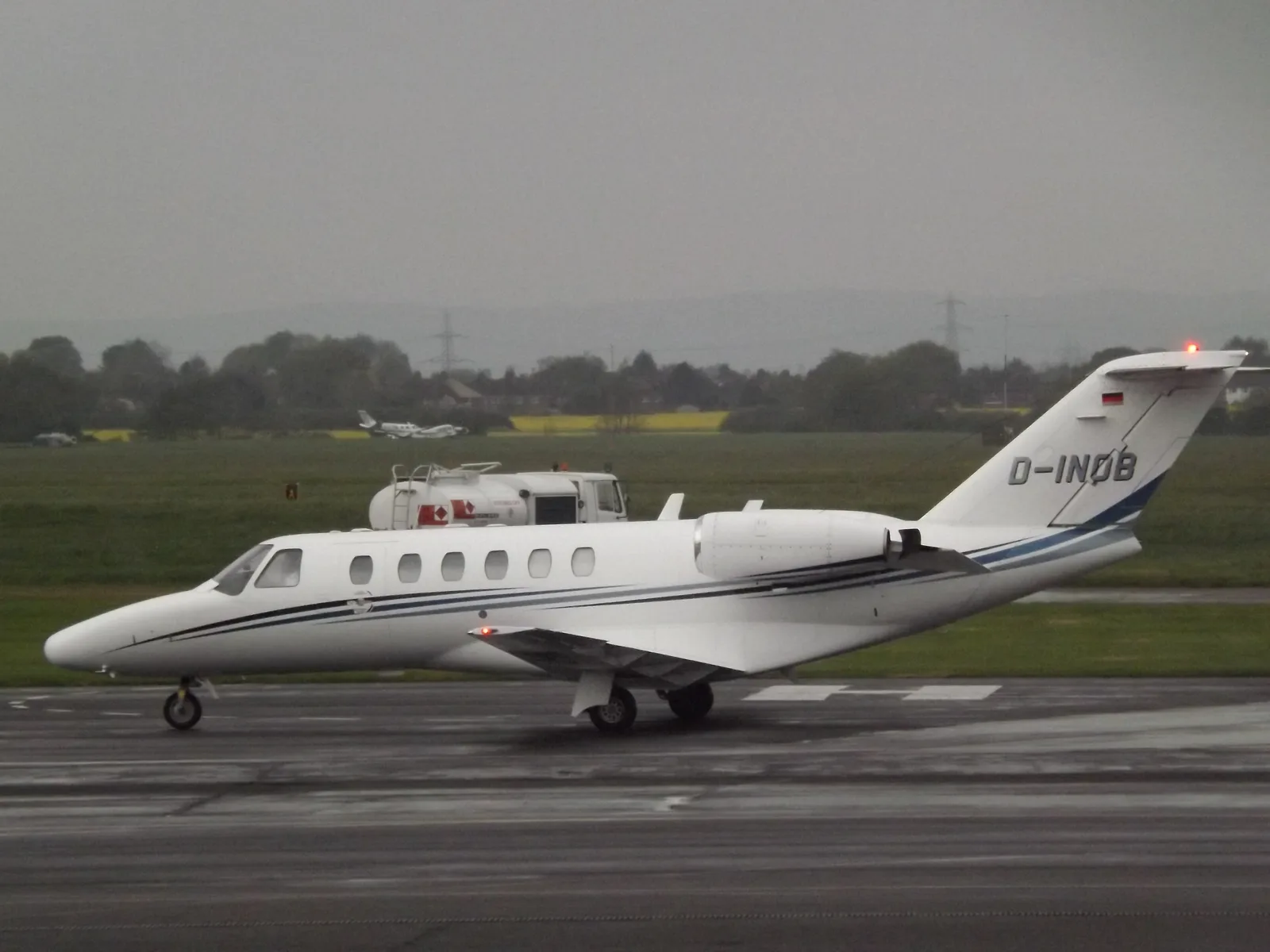 Ground crew supporting a Cessna Citation CJ2 private business jet on the ramp